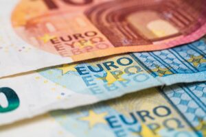 Macro photograph of the word euro on a euro banknote